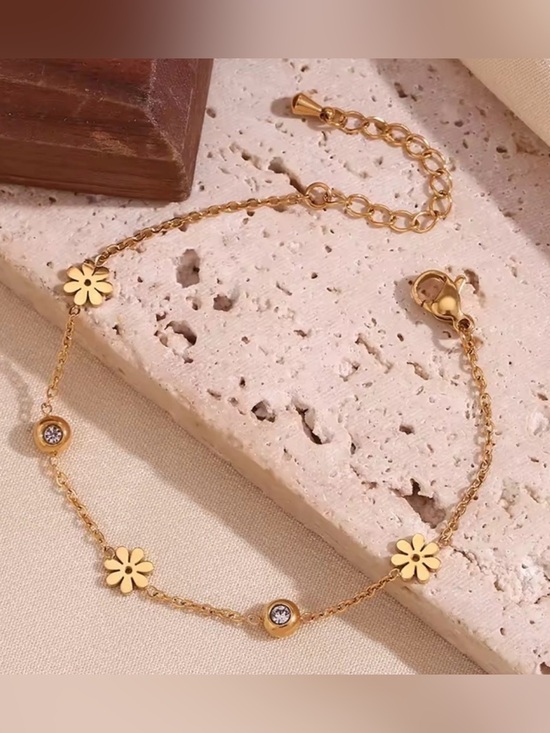 Anthropologie Jewelry - Double Sided Back and White
Flower Bracelet 18K Gold plated
Stainless Steel